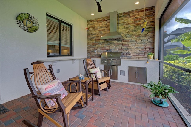 interior space with ceiling fan, grilling area, and exterior kitchen