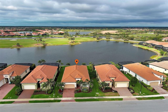 aerial view with a water view and a residential view