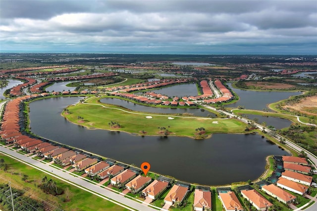 bird's eye view with a water view and a residential view