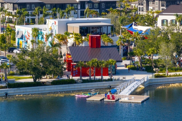 birds eye view of property featuring a water view