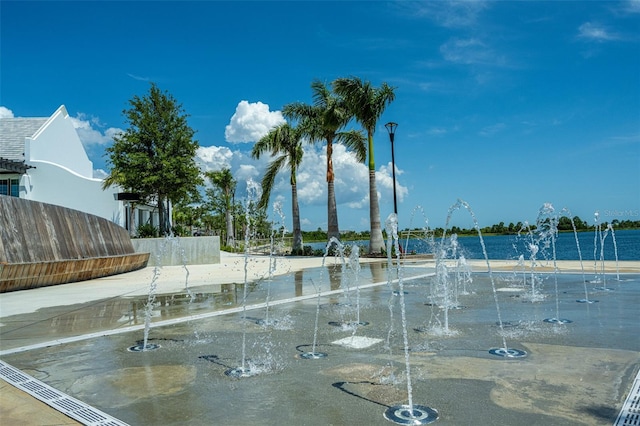 view of community featuring fence