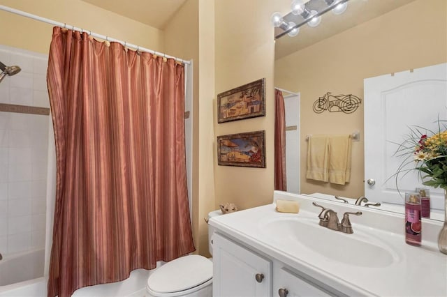 full bathroom with toilet, shower / bath combination with curtain, and vanity