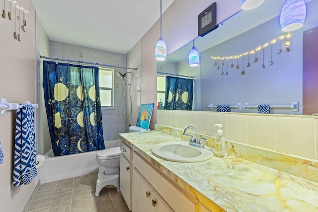 bathroom with toilet, shower / bath combination with curtain, tile patterned flooring, and vanity