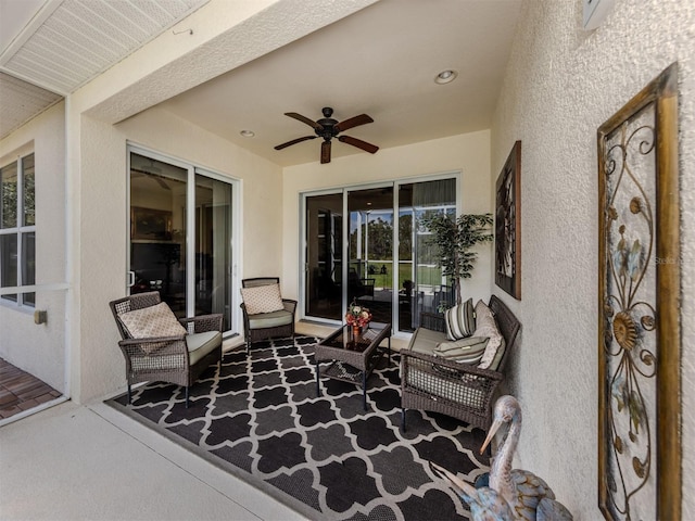 view of patio / terrace featuring ceiling fan