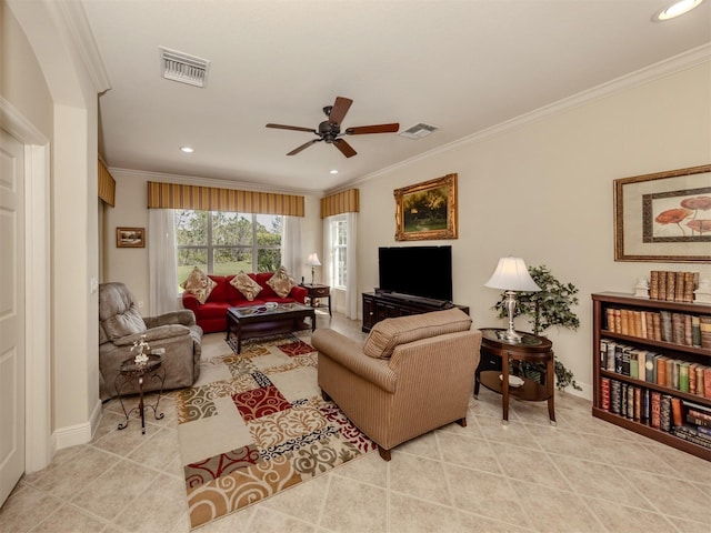 living room featuring light tile patterned floors, a ceiling fan, visible vents, and crown molding