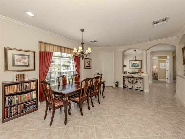 dining space featuring arched walkways, light tile patterned floors, visible vents, and crown molding