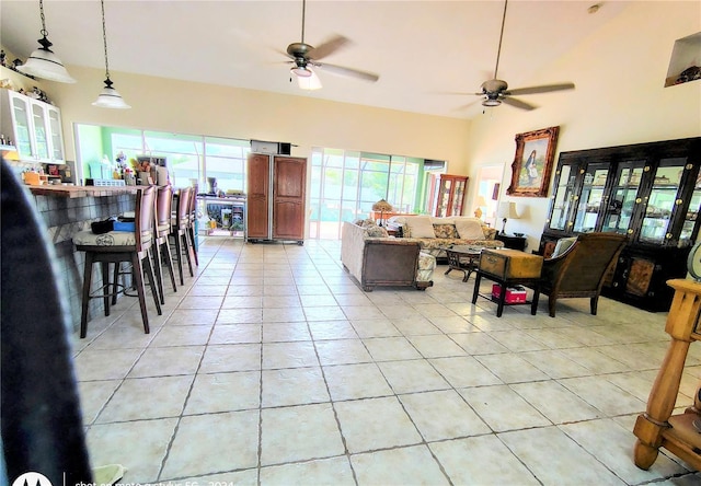 23495 Altman Ave, Punta Gorda, FL 33980 - living room featuring a high ceiling, light tile patterned floors, and a ceiling fan