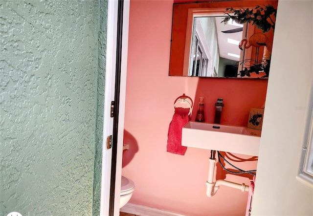 23495 Altman Ave, Punta Gorda, FL 33980 - bathroom featuring toilet and a sink