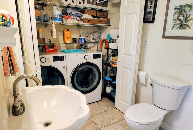 23495 Altman Ave, Punta Gorda, FL 33980 - laundry room with independent washer and dryer, a sink, light tile patterned floors, and laundry area