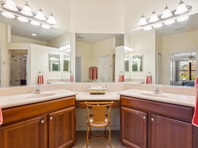1425 Maseno Dr, Venice, FL 34292 - bathroom featuring tile patterned floors, vanity, and a stall shower