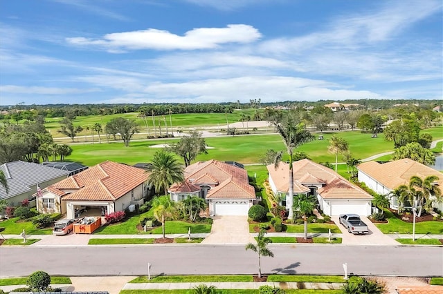 aerial view featuring a residential view and golf course view