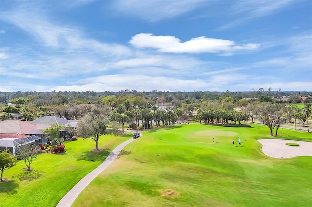 view of home's community featuring golf course view