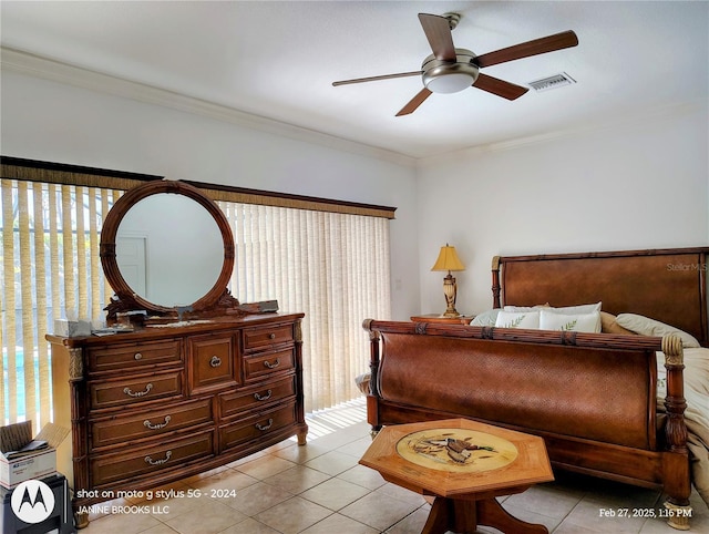 bedroom featuring ceiling fan, light tile patterned flooring, visible vents, and crown molding