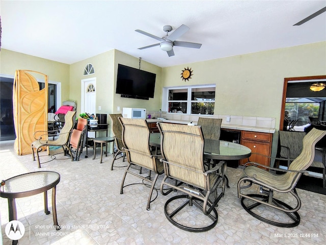 interior space with a ceiling fan