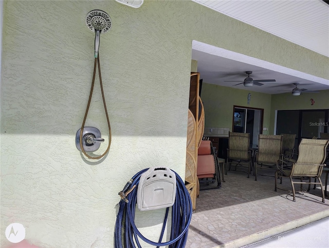 view of patio with ceiling fan