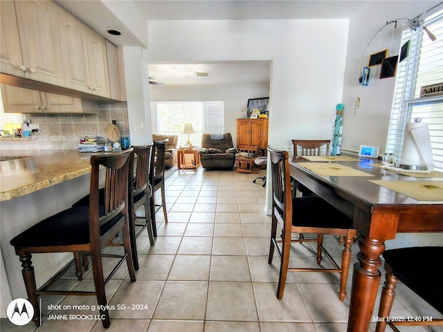 dining room with light tile patterned floors