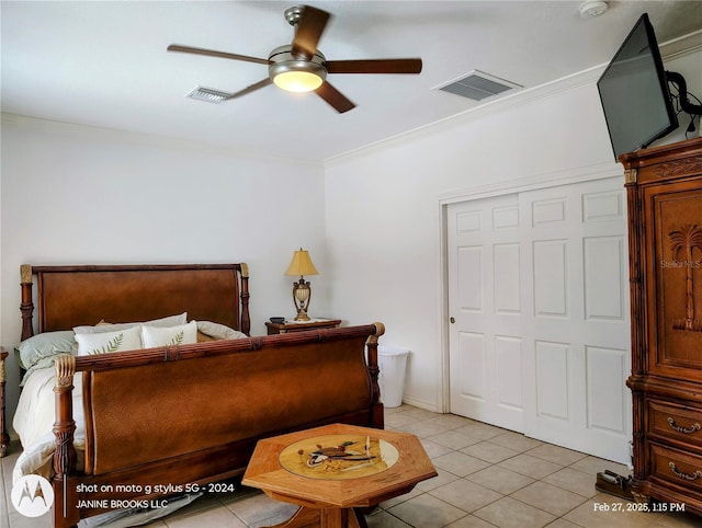 bedroom with light tile patterned floors, ceiling fan, visible vents, and ornamental molding