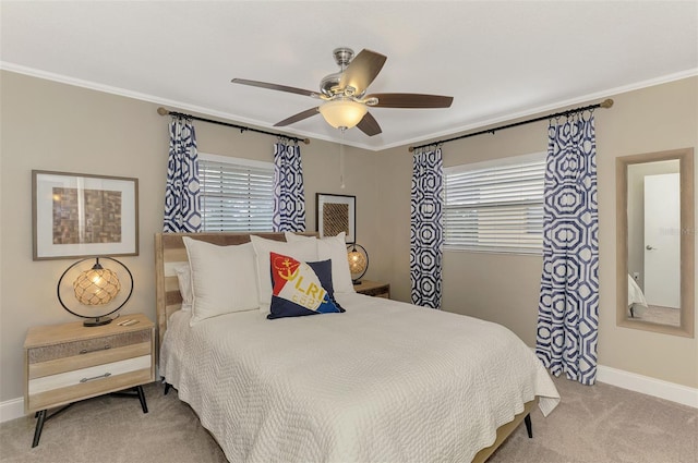 bedroom featuring carpet floors, baseboards, ornamental molding, and ceiling fan