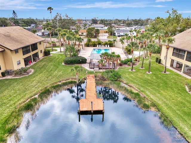 aerial view with a water view and a residential view