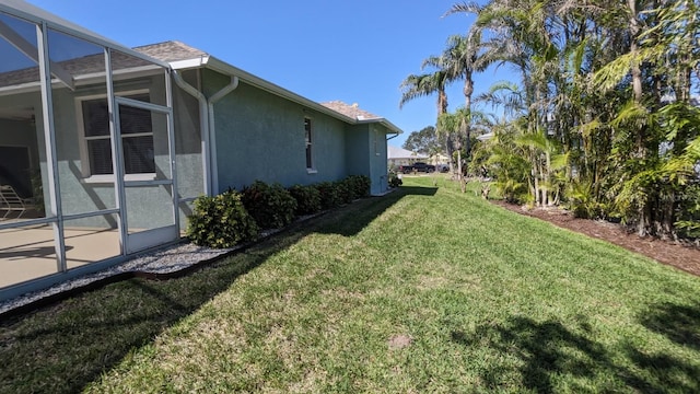 view of yard featuring a lanai