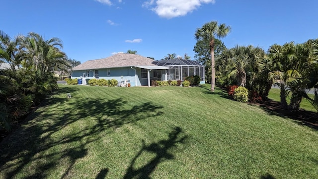 view of yard featuring a lanai