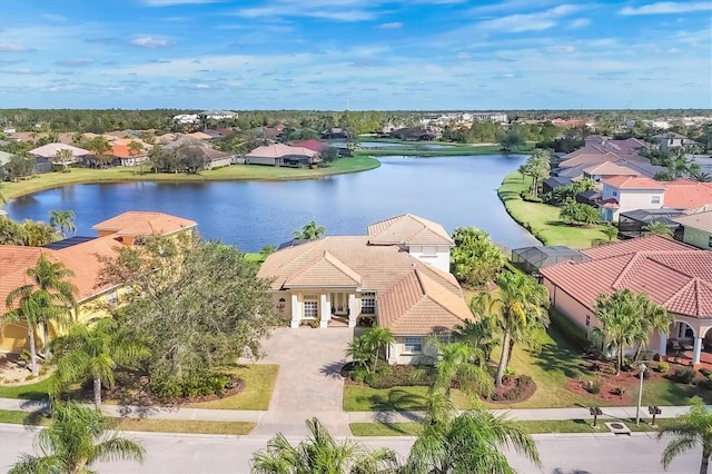 bird's eye view with a water view and a residential view