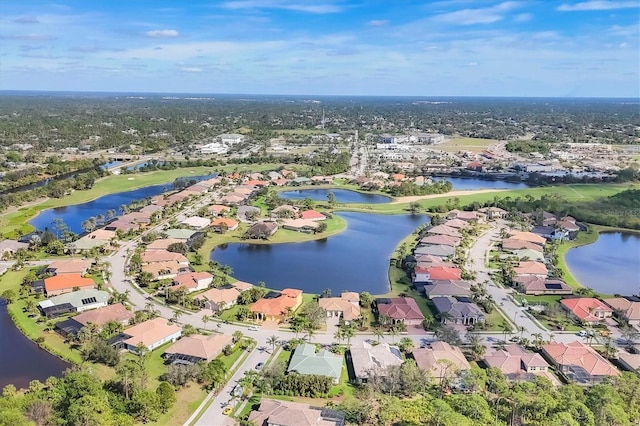 aerial view with a water view and a residential view