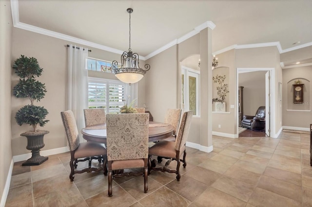 dining area with arched walkways, ornamental molding, light tile patterned flooring, and baseboards