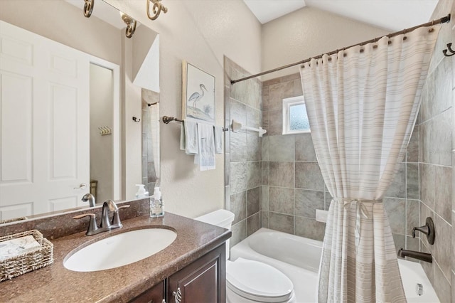 full bathroom featuring lofted ceiling, toilet, shower / bath combo with shower curtain, and vanity