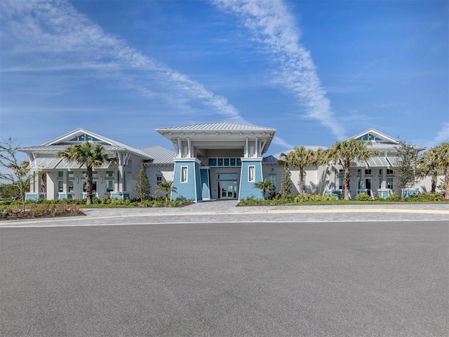 view of front of home featuring a standing seam roof and metal roof