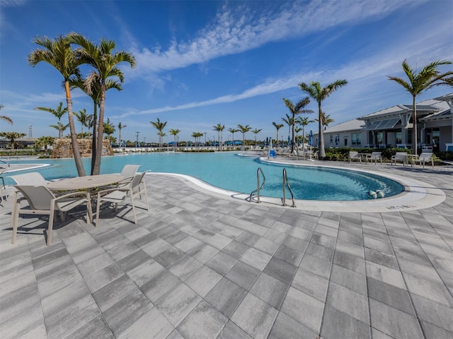 community pool featuring a patio