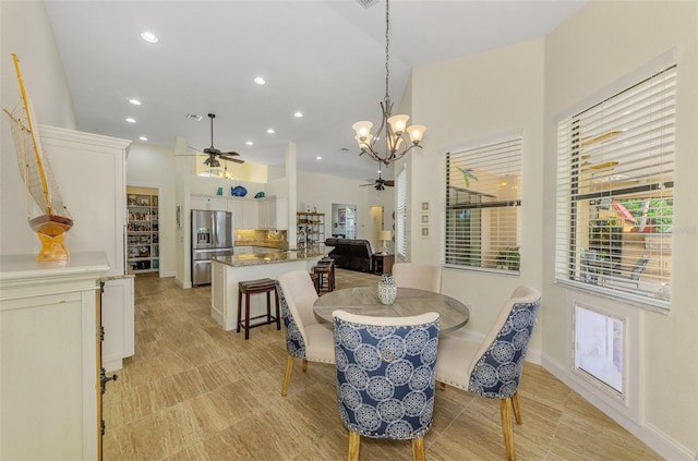 dining area featuring ceiling fan with notable chandelier, baseboards, and recessed lighting