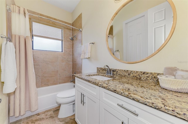 full bathroom featuring toilet, shower / tub combo, and vanity