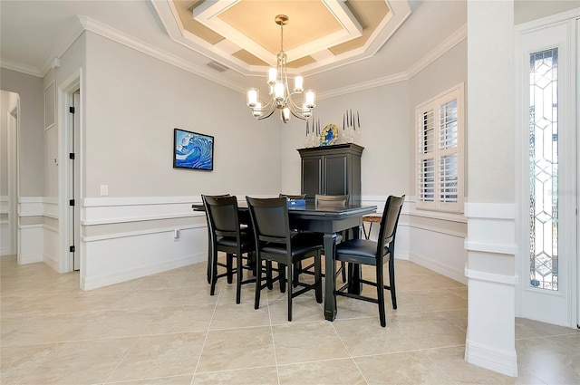 dining area featuring a chandelier, a raised ceiling, visible vents, and crown molding