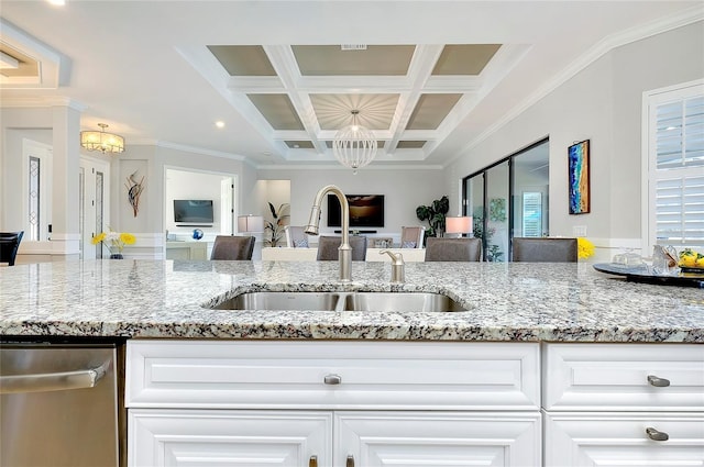 kitchen with a chandelier, stainless steel dishwasher, coffered ceiling, and a wealth of natural light