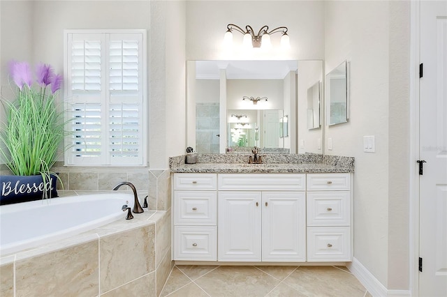 bathroom with a garden tub, tile patterned flooring, a tile shower, and vanity