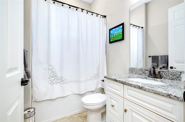 bathroom featuring shower / bath combo, vanity, toilet, and tile patterned floors