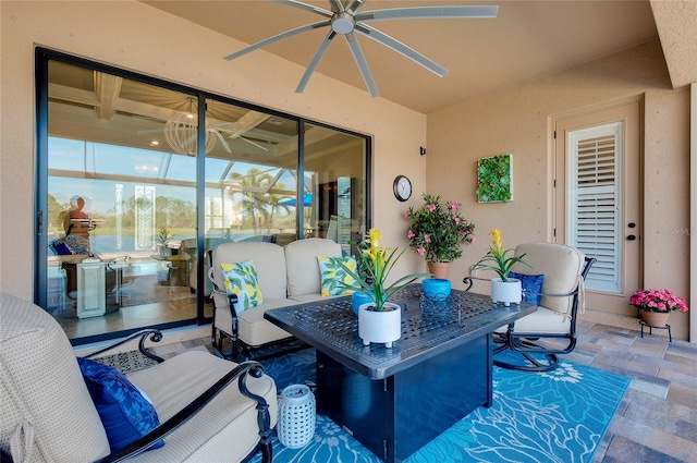 view of patio / terrace featuring a ceiling fan