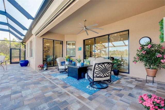 view of patio / terrace with a lanai and a ceiling fan