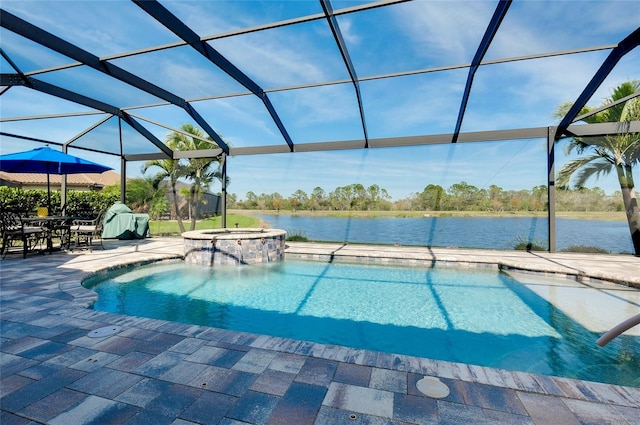 view of pool with a patio, a pool with connected hot tub, a water view, and glass enclosure