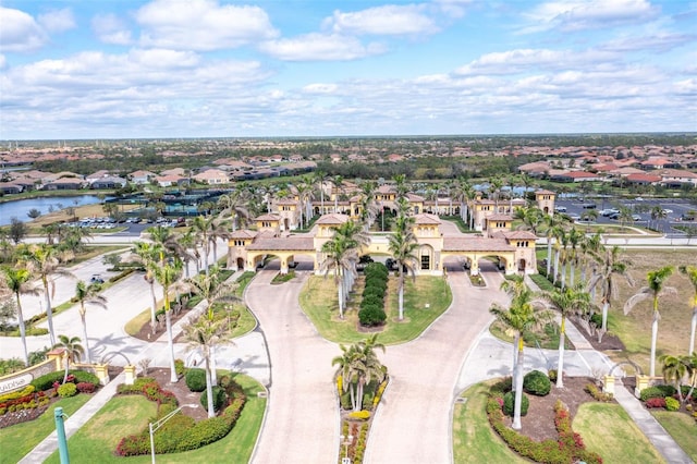 aerial view featuring a residential view and a water view