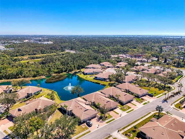 birds eye view of property featuring a residential view and a water view