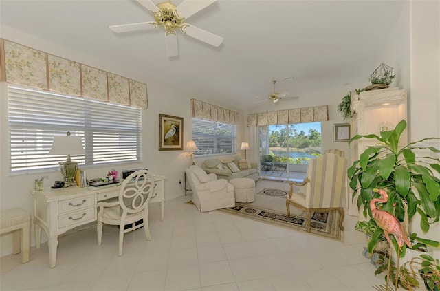 interior space featuring lofted ceiling and ceiling fan