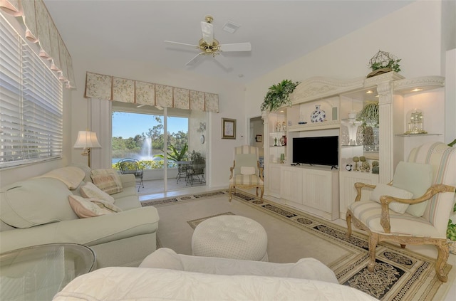 living area with visible vents and a ceiling fan