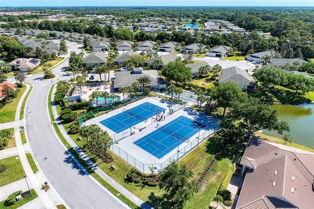 aerial view with a residential view and a water view