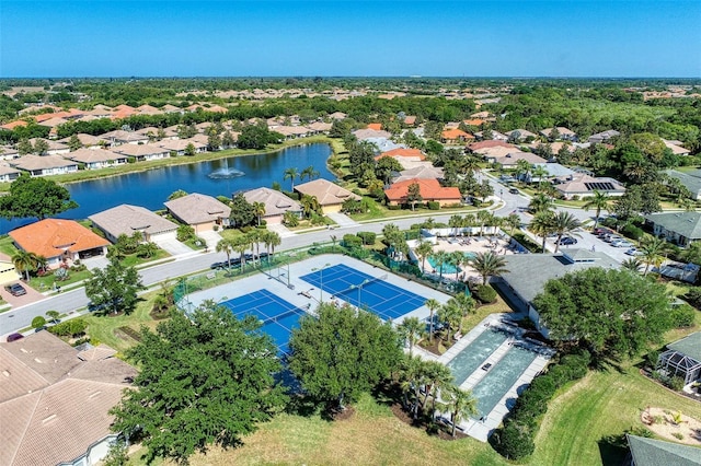 aerial view featuring a residential view and a water view