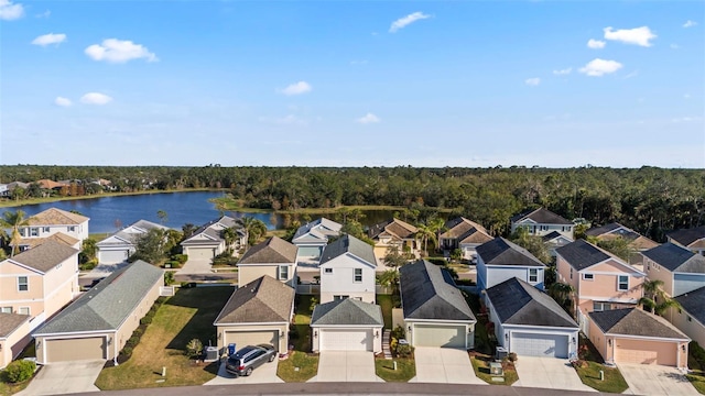 aerial view with a residential view and a water view