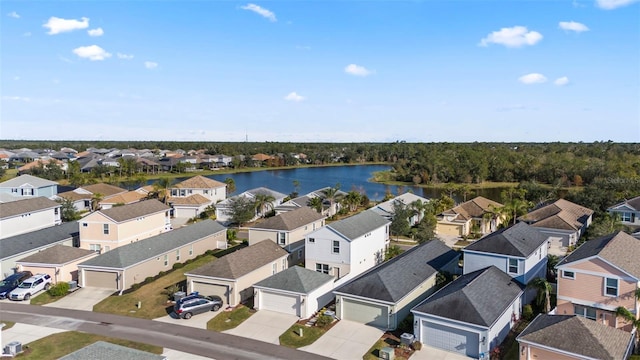 aerial view featuring a water view and a residential view