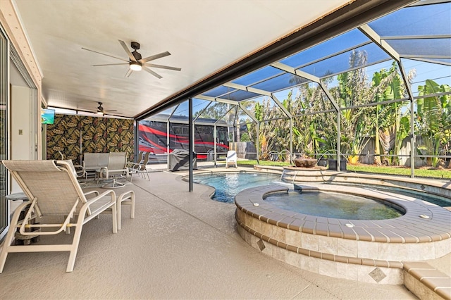 pool with a ceiling fan, outdoor dining space, a lanai, and a patio area