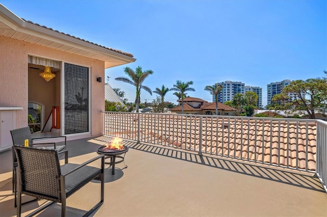 view of patio / terrace with an outdoor fire pit